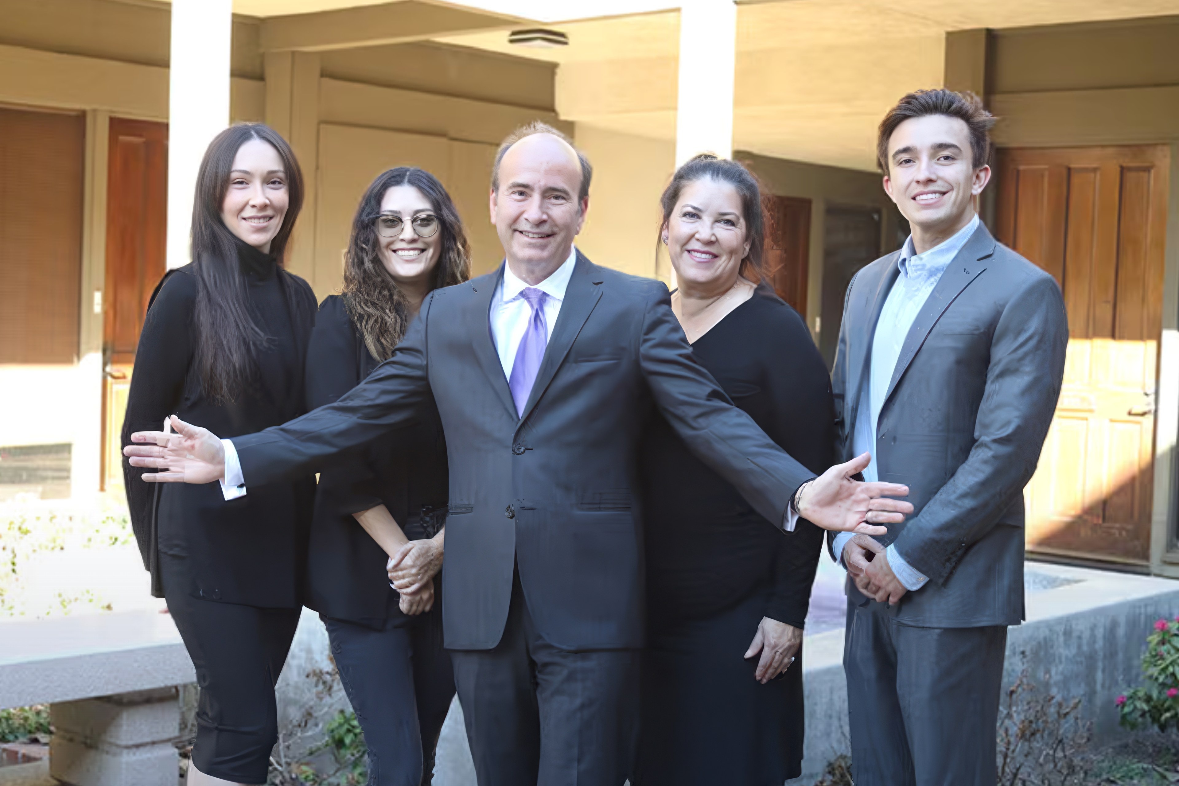 Kyle Scott with the Kyle Scott Law team in Tustin